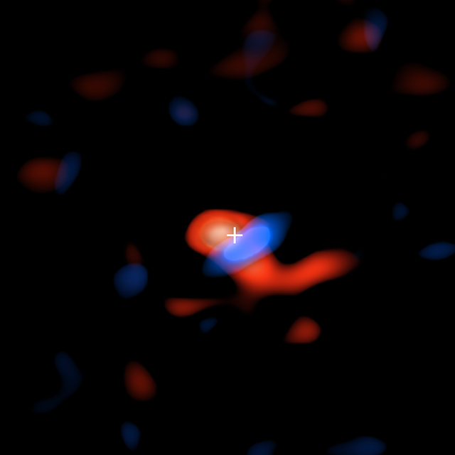 ブラックホールの周囲を流れる円盤状の低温水素ガスの画像