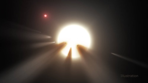 粉々になった彗星によって光がさえぎられるKIC 8462852の想像図 