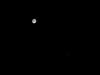 （月と火星の接近の写真）