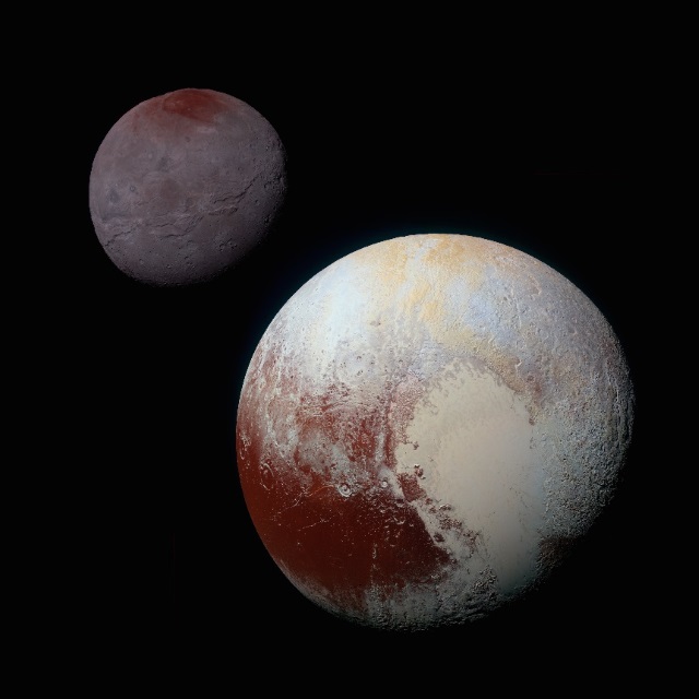 冥王星（右下）とカロン（左上）