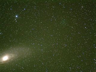 （エンケ彗星とM31の画像）