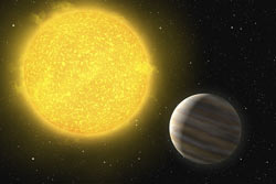 （発見された惑星OGLE2-TR-L9bと恒星の想像図）