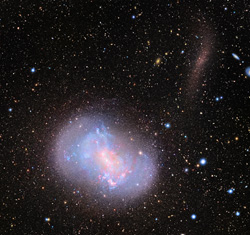 NGC 4449と飲み込まれる矮小銀河