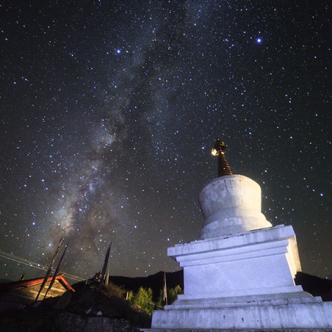 Tibetan Buddhist tower under the Milky Way