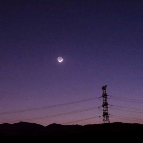 宵の地球照と星