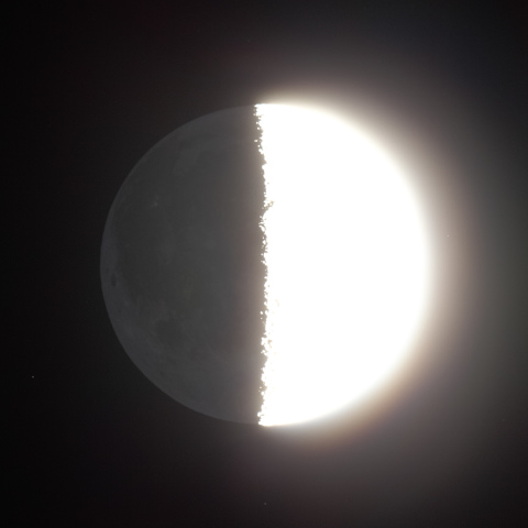 地球照（月齢7.7）