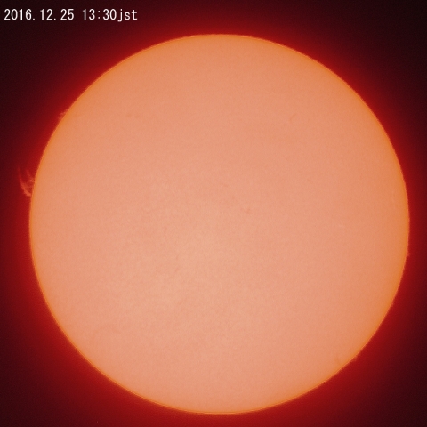 細いプロミネンスの吹き出ている太陽、12月25日