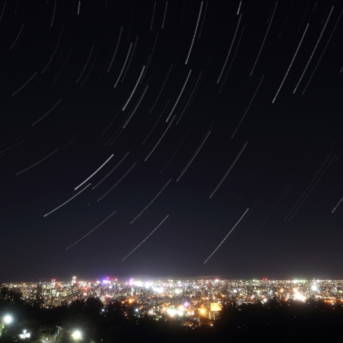 星の光跡とサッポロ夜景