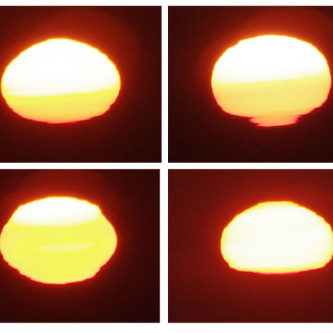 日没時のゆらいだ太陽（１）